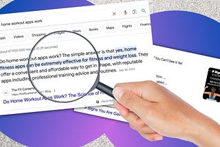 A hand holding a magnifying glass over a featured snippet on Google