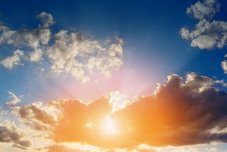Sun rays bursting through the clouds