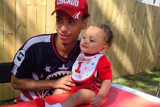 Photo of Daunte Wright with his child celebrating their first birthday.