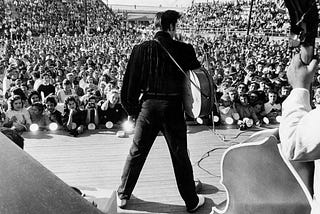 Elvis’ energetic and exciting performances drew large crowds of listeners, especially teenaged girls.