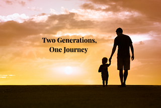 an image of a father holding the hand of his son in front of a sunset.