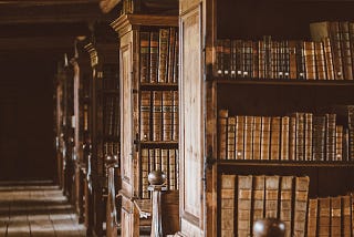 The corridor of an old library.