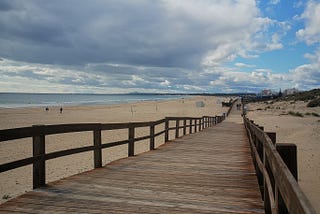A boardwalk in Portugal; beach; sand; sea