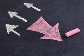 White and pink arrows high view