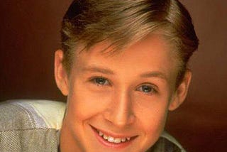 A picture of the beloved Canadian actor Ryan Gosling as a young boychild, giving the camera a million dollar smile. Adorable.