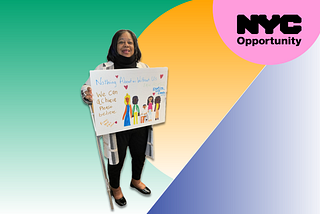 A woman with shoulder-length dark hair, wearing a black outfit and a light-colored open-front cardigan, stands smiling while holding a handmade sign. The sign features colorful drawings of diverse people holding hands and includes handwritten text that reads: “Nothing About Us Without Us. We Can Do This! Please Believe in Us.” The background consists of a gradient with green, yellow, and purple sections, and in the upper right corner, a pink circle contains the text “NYC Opportunity