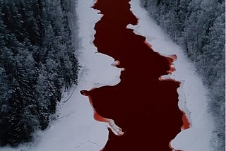 a river in Russia that has taken on a red hue, reselmbling blood instead of water.