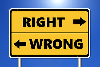 Picture of a sign with text “Right” and “Wrong” in opposing directions with arrows.