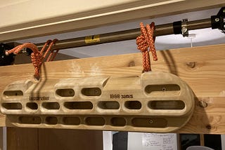 Minimal no-wall-drill removable hangboard mount