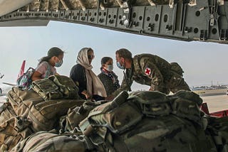 Military flights evacuate civilians from Afghanistan