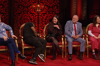 Andy Zaltzman looks a bit miffed, Emma cringes, Jack is grumpy, Rosie is trying not to look at anyone, Baba has lost his mind