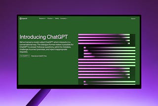 Monitor screen showing ChatGPT landing page