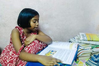 I sit watching as my daughter grapples with her 'value education' studies.