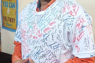 Guinness World Record Attempt For Most Signatures on T shirt In One Hour By Dinesh Gupta.