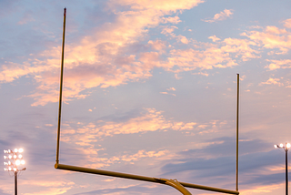 A yellow football goalpost.