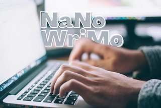 Person typing of silver computer with both hands. The word NaNo is centered and underneath it is WriMo centered. Letters are in grey color with white outline.