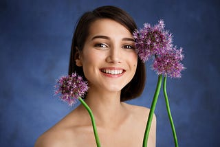 young woman with lilac flower