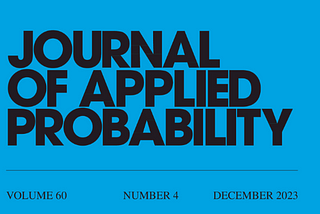 Journal of Applied Probability -kansilehti sinisellä taustavärillä ja mustalla tekstillä.