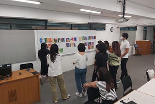 Photograph of a lecturer teaching in class