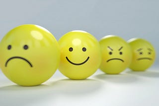 smiley faces for anger, happiness and rudeness