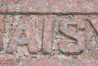 A tombstone with the name Daisy inscribed on it