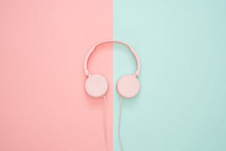 headphones pink on one side and green on the other