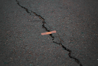 Bandaid covering a crack.