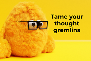 An orange fluffy gremlin wearing square glasses stares at the words “Tame your thought gremlins”