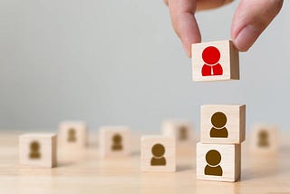 Capabilities are building blocks as represented by the wooden blocks. To build them the right way, you need a workforce capability framework.