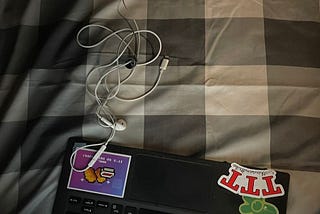 my bed, my laptop, and tools of my happiness (earphone)
