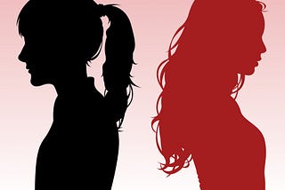 The silhouettes of two women facing away from each other. The girl on the right is red and the girl on the left is black.