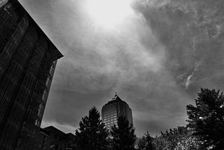 Black and White photo of the KOIN Center Building and the sky in Downtown Portland, Oregon