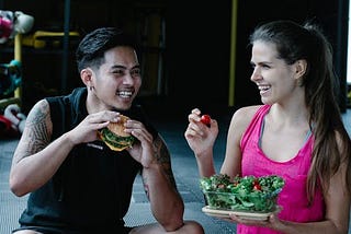 People enjoying food after working out