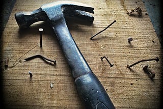 Picture of a hammer and nails