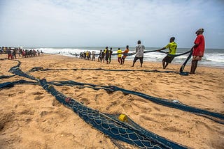 Image of active fishermen in Cape Coast, Ghana by Anthony Pappone on Flickr