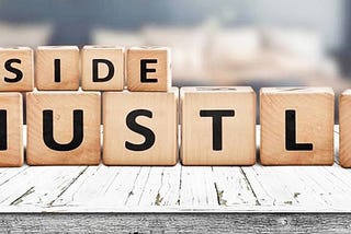 Letter blocks spelling ‘Side Hustle’