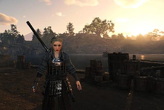 The main character in Rise of the Ronin stands near a river at sunrise.