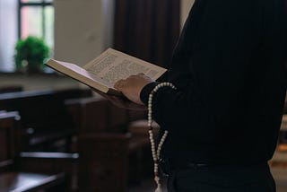 A pastor reading the Bible