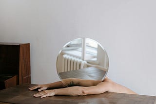 Person with mirror head
