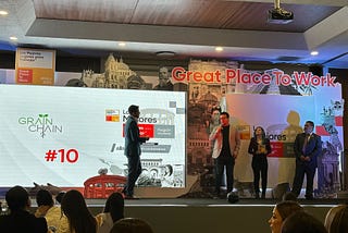 GrainChain team members on stage accepting an award for being named one of the top 20 places to work in Mexico by Great Place to Work Mexico.