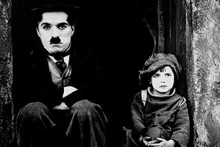 Review: “The Kid" (1921)~Two Little Tramps