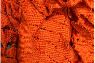 Challenges and solutions for recovering mixed fiber waste from knitted used textiles
