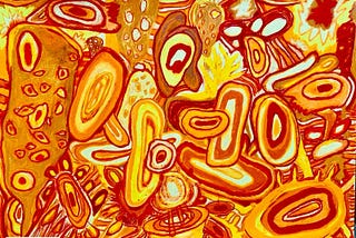 Abstract composition of biomorphic forms in vivid yellows, oranges, and reds. The scene resembles a chaotic microscopic environment, with oval and oblong shapes suggestive of cells, nuclei, and organic tissue. Many forms are ringed or layered concentrically, evoking cellular membranes or cross-sections of plant structures. Some figures have internal dot patterns, resembling spores or organelles. The background is densely packed with these shapes, creating a sense of biological entanglement.
