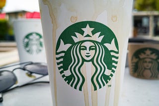 Starbucks Sentences Green and White Disposable Cups to a Slow Death