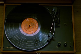 a black and brown vinyl record player