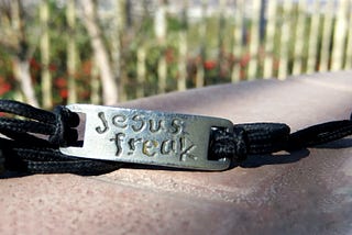Jesus Freak bracelet. This photograph is © Copyright 2010–2023 to Deb Wax, the photographer. All Rights Reserved. The use of this photograph without the photographer’s written permission is strictly prohibited, and violations will be pursued to the furthest extent allowed under the law. You can find my photographs for commercial use on Shutterstock. There is a charge for the use of any image for commercial purposes.