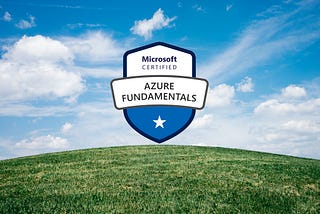 Shield logo that reads “Microsoft Certified Azure Fundamentals” on a blue sky background with a green, grassy hill.