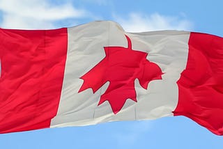 Flag of Canada flying upside down; indicating distress