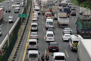 Congested Cities and the Unavoidable Commute Time