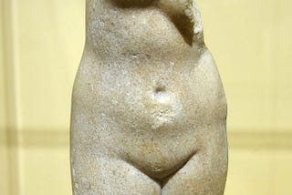 Public domain, (cc-zero), photo by Daderot, Description: Aphrodite statuette, Greek, late Hellenistic of a type found in Egypt, 50 BC — 50 AD, crystalline Parian marble — Fitchburg Art Museum